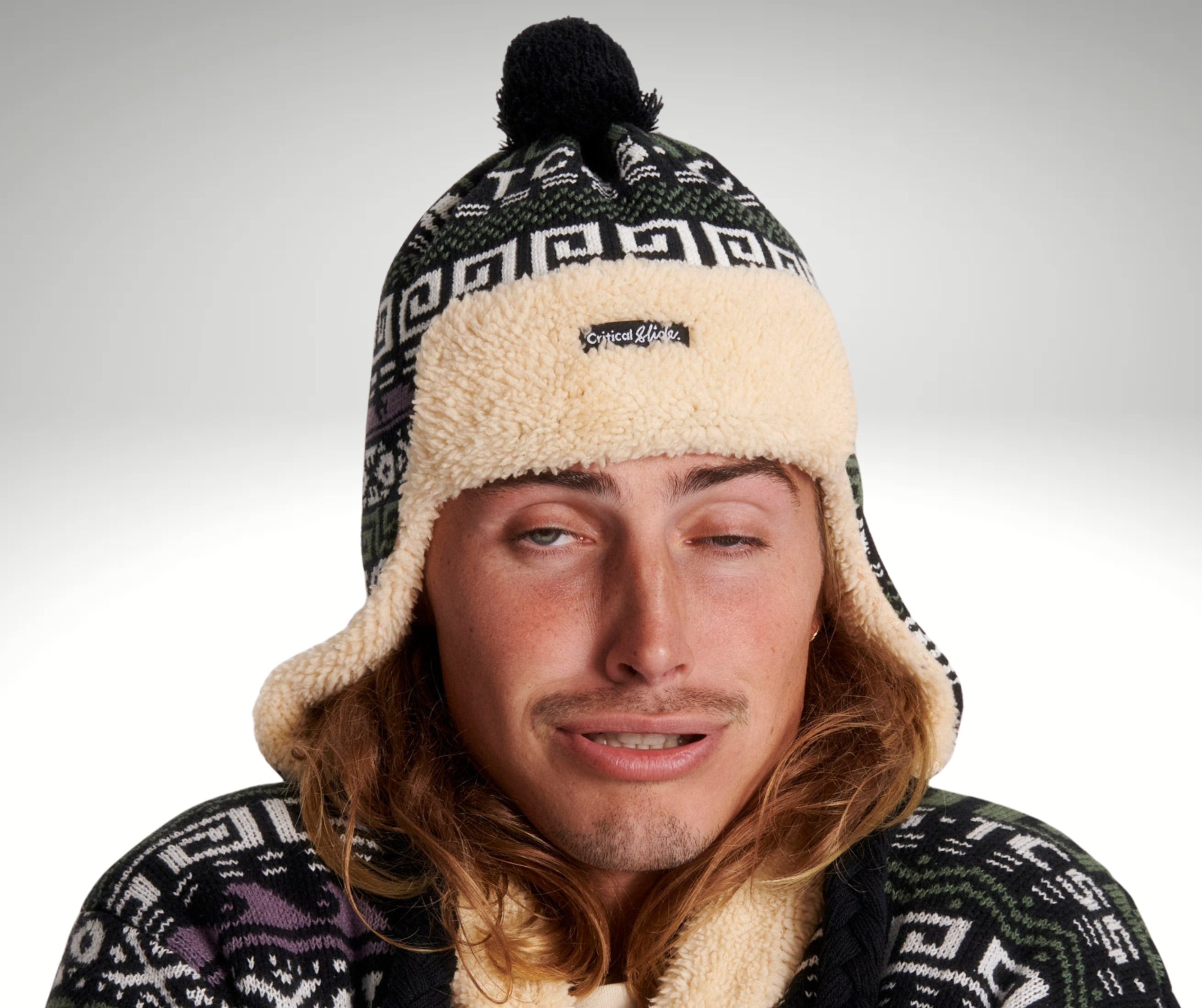 Critical Slide Blunder Trapper Beanie